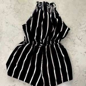 Girls Shein shorts jumpsuit.  Black and cream. Spaghetti strap. Back zippers